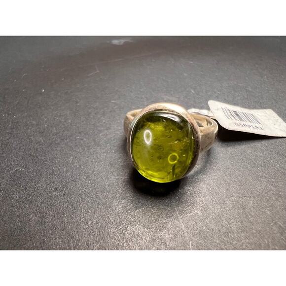SOLD 

NEW size 7 oval peridot sterling silver ring 6.20 grams - Picture 11 of 15